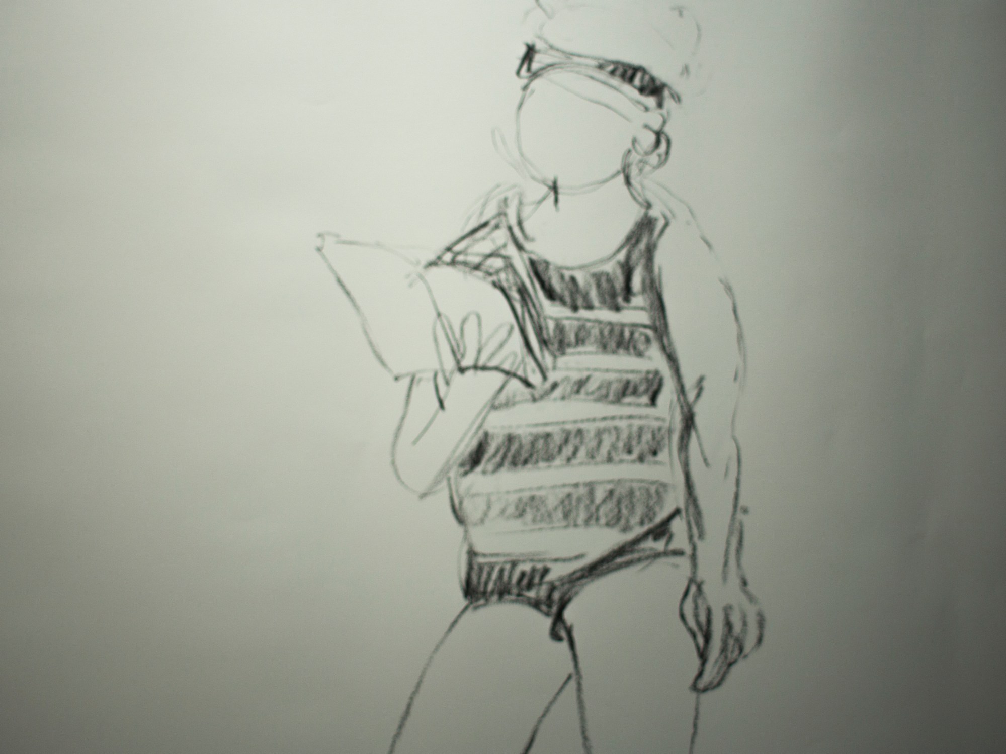 Een vrouw op het strand leest een boek drawing stop-motion movie model charcoal