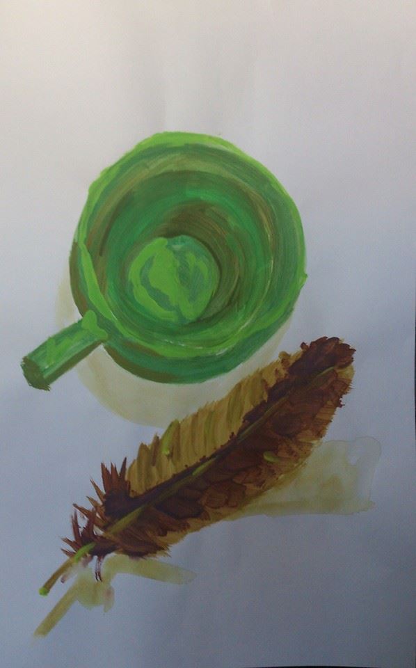 still life feather cup bird's eye view